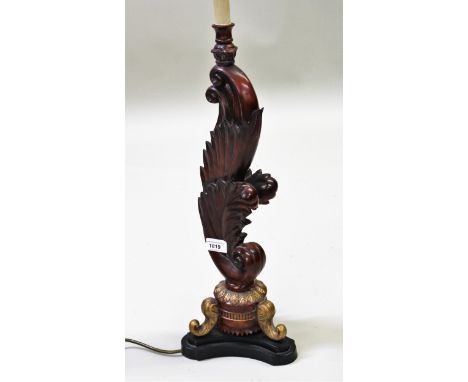 Reproduction carved and parcel gilt table lamp of scroll design with tripod base, 55cms high excluding the lamp fitting 