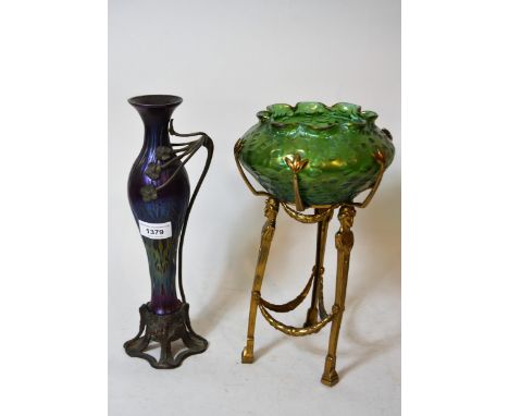 Art Nouveau iridescent glass specimen vase with patinated metal floral design mounts, 30cms high together with a green irides