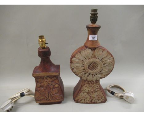 Large Sunflower pattern stoneware table lamp, 45cms high together with a similar floral relief moulded stoneware table lamp, 