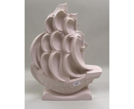 Continental Art Deco pottery model of a galleon under sail, 49cms high, together with a similar figure of a seated girl and d
