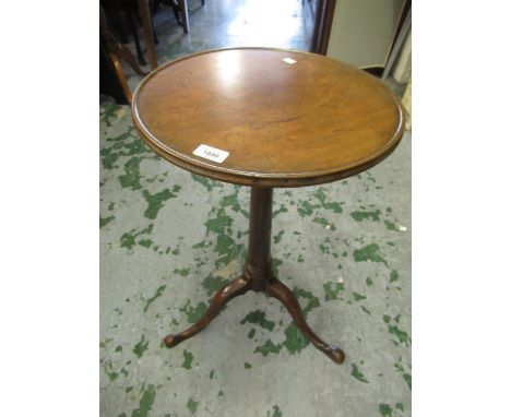 18th Century oak circular pedestal wine table, the dish top above a tapering column and tripod base, 40cms diameter68cm high.