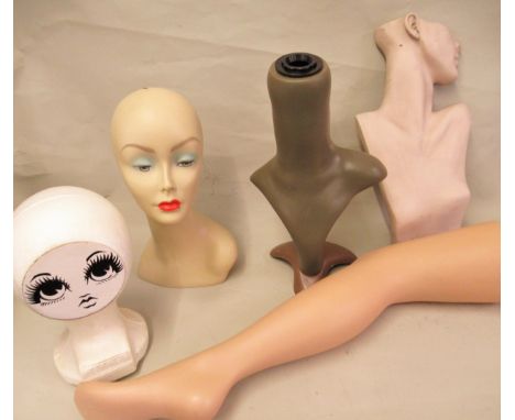 Quantity of various shop display mannequin parts including torso, stocking display leg, two heads etc. 