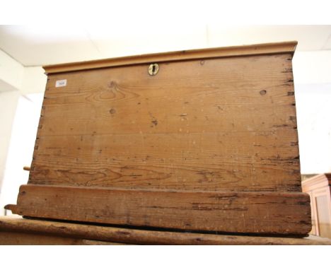 Small stripped and polished pine trunk with hinged cover, 74cms wide 
