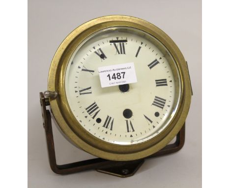 Brass cased ships clock with wall mounting bracket, dial and movement (for restoration) 
