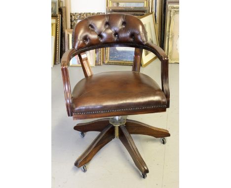 Reproduction mahogany brown leather and button back upholstered swivel office armchair 