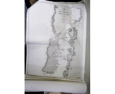 Quantity of 19th Century unframed Ordnance Survey maps of Scotland and a quantity of reproduction world sea charts 