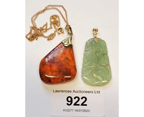 Baltic amber pendant with gilt metal mounts on a 9ct gold chain, together with a small modern carved pale jade pendant with 1