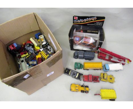 Box containing a small quantity of various diecast metal model vehicles, including Dinky, Supertoys, Corgi etc. 