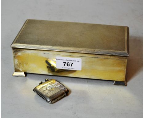 Birmingham silver rectangular cigarette box with hinged engine turned cover, together with a silver vesta case 