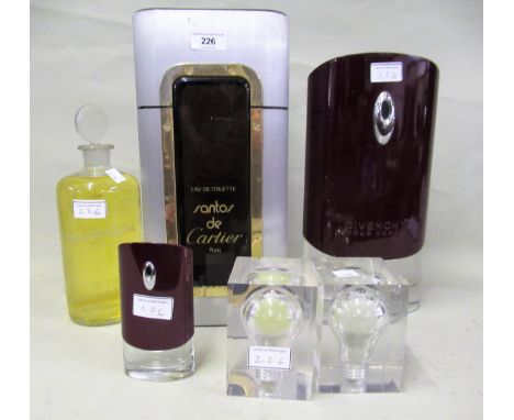 Large Cartier shop display perfume bottle , another Givenchy, and another Elizabeth Andrew together with a smaller Givenchy p