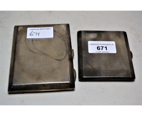 Two silver engine turned cigarette cases, 8oz t 