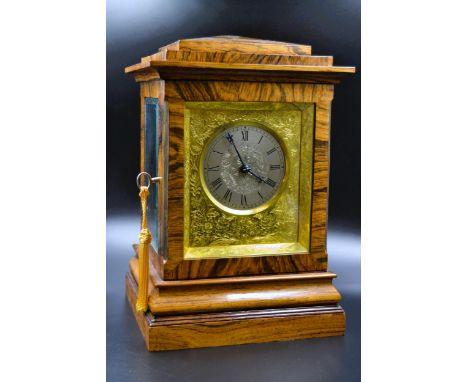 Fine rosewood cased table / mantel timepiece, the architectural four glass case enclosing a floral engraved gilt brass dial w