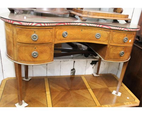 Edwardian satinwood and black line inlaid kidney shaped dressing table, the glazed and fabric covered top above five drawers 