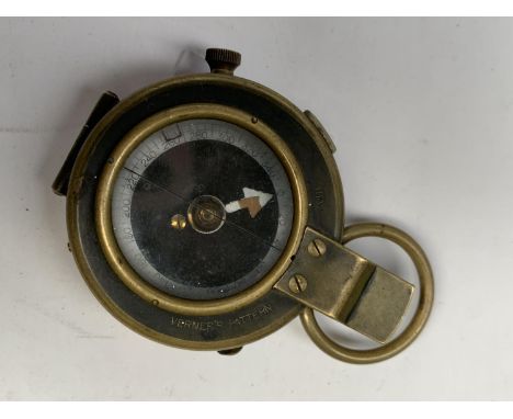 A 1917 CROWS FOOT BRASS COMPASS 