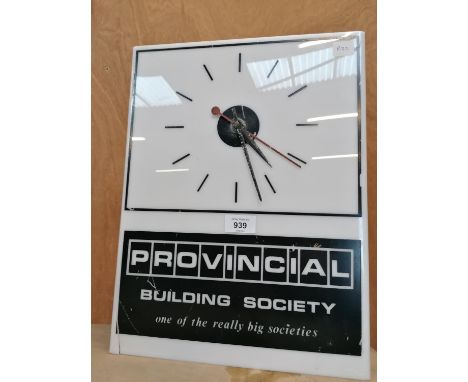 AN ILLUMINTAED PROVINCIAL BUILDING SOCIETY CLOCK 
