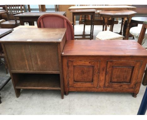 A MAHOGANY LINEN CHEST WITH HINGED TOP AND LOWER SHELF AND A PINE BLANKET CHEST WITH HINGED TOP 