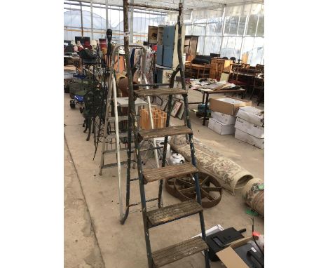 TWO SETS OF STEP LADDERS TO INCLUDE A FIVE STEP METAL AND WOOD AND A FOUR STEP ALLOY 