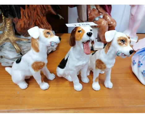 A COLLECTION OF THREE ROYAL DOULTON CERAMIC DOGS 