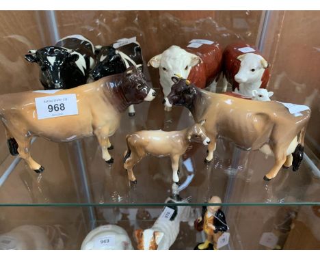 A COLLECTION OF BESWICK JERSEY CATTLE CERAMIC MODELS TO INCLUDE BULL, COW AND CALF 