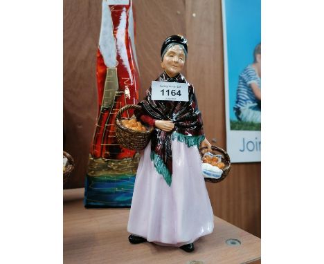A ROYAL DOULTON CERAMIC LADY FIGURE - 'THE ORANGE LADY' HN 1954 