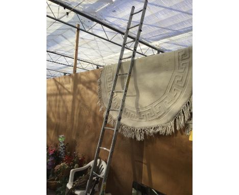 A MIXED LOT TO INCLUDE A FOUR SECTION TWELVE RUNG ALLOY LADDER, A THICK ROPE, GARDEN CHAIR, WALKING STICKS, PLASTIC BARREL ET