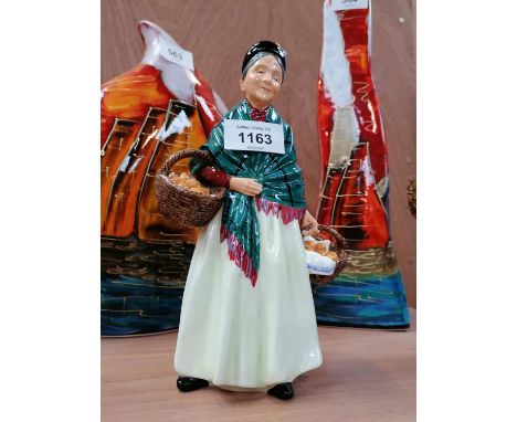 A ROYAL DOULTON CERAMIC LADY FIGURE - 'THE ORANGE LADY' HN 1953 