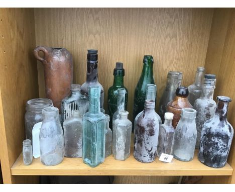 A COLLECTION OF VINTAGE BOTTLES 