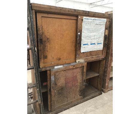 A VINTAGE WOODEN CUPBOARD WITH FOUR SLIDING DOORS 