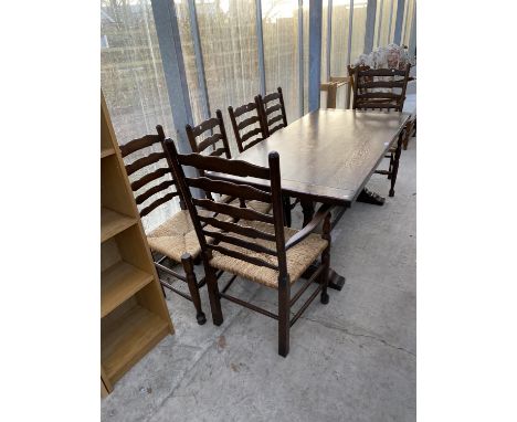AN OAK REFECTORY DINING TABLE AND FOUR LADDER BACK OAK DINING CHAIRS WITH RUSH SEATS AND TWO MATCHING CARVERS 