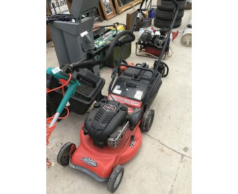 A ROVER PROCUT 560 MULCH AND CUT LAWN MOWER WITH A BRIGGS AND STRATTON 825 SERIES 190CC  ENGINE 