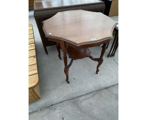 A MAHOGANY OCCASIONAL TABLE WITH LOWER SHELF 