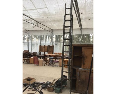 A VINTAGE TWENTY FOUR RUNG TWO SECTION WOODEN LADDER AND A QUANTITY OF PLASTIC GARDEN TROUGHS 