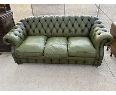 A GREEN LEATHER BUTTON BACK THREE SEATER CHESTERFIELD SOFA 