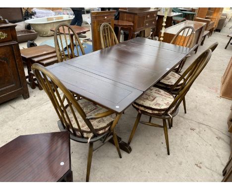 AN ERCOL DRAW LEAF ELM DINING TABLE WITH FOUR ERCOL DINING CHAIRS AND TWO CARVERS 