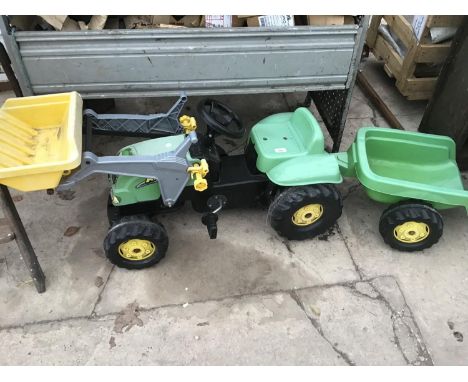 A CHILDS RIDE ON  PEDAL TRACTOR WITH FORE END LOADER AND TRAILER 