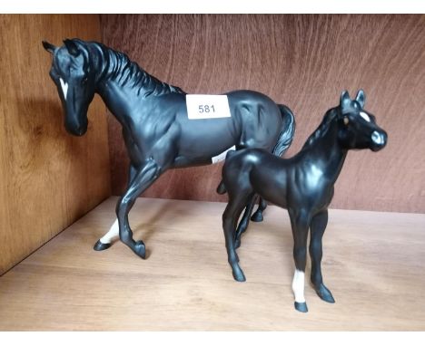 TWO BESWICK CERAMIC HORSE MODELS - BLACK BEAUTY AND FOAL 