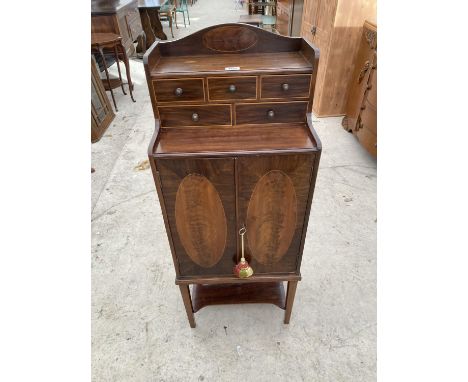 A SMALL VICTORIAN INLAID MAHOGANY CABINET WITH TWO DOORS, FIVE SMALL DRAWERS AND LOWER SHELF 