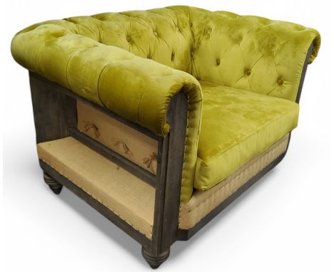 A partially traditional upholstered deep button backed tub chair in a lime green velvet, limed oak frame, seat height 43cm