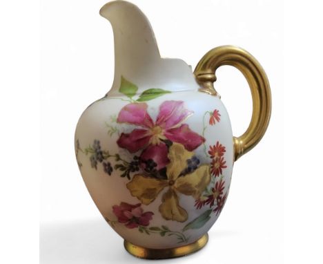 A Royal Worcester flat sided jug, printed and painted with flowers and foliage, on a blush ivory ground, ribbed gilt loop han