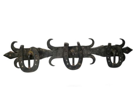 Equestrian interest - a 19th century wrought iron tack room coat rack, applied horse shoe hooks, 15cm x 70cm