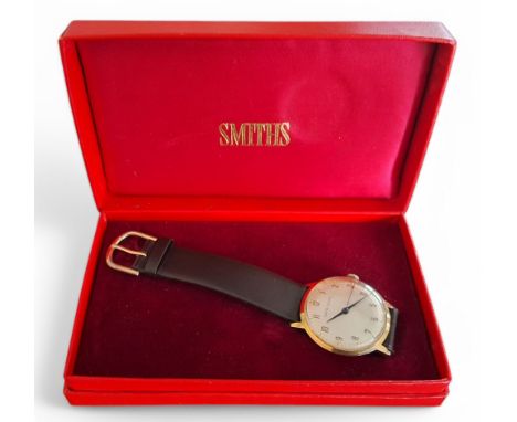 A Smiths Astral gold plated gentleman's wristwatch, manual movement, silver coloured dial, Arabic numerals, w/o, later brown 