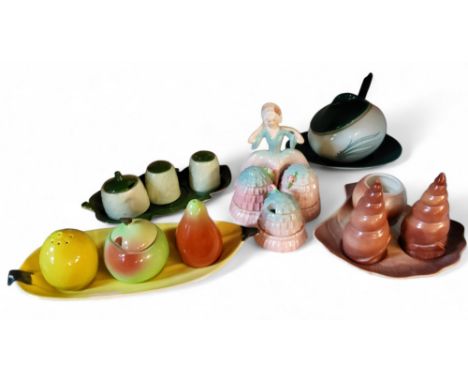 A Carlton Ware three piece cruet set, in the form of an apple, pear and lemon;&nbsp; others, crinoline lady;&nbsp; shells;&nb