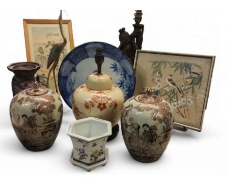 A Japanese charger, decorated in underglazed blue with pine and palm trees, 31cm diam, Meiji period;&nbsp; a hardwood figural