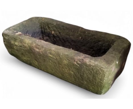 A small Derbyshire gritstone trough, approximately 20cm x 70cm x 20cm