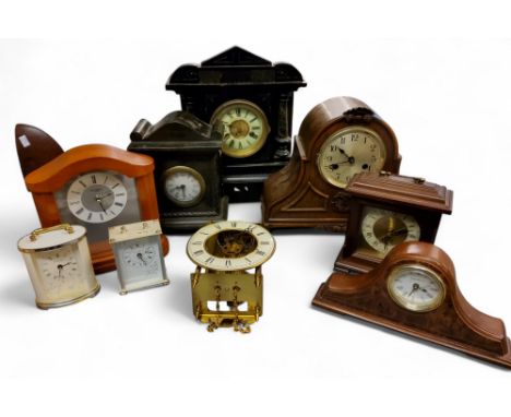 A 19th century German mantel clock. in faux slate, Roman numerals, twin winding holes, 14 day strike, c.1880;&nbsp; &nbsp;ano