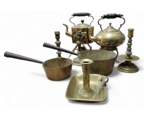 A 19th century brass copper kettle on stand;&nbsp; another;&nbsp; &nbsp;a brass saucepan, steel handle, 36cm long;&nbsp; anot