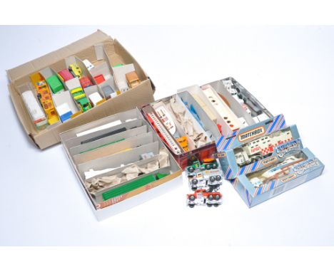 A group of Matchbox Convoy Series in addition to Majorette diecast issues, as shown. Generally playworn. 
