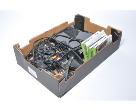 A Microsoft Xbox 360 video gaming console with controllers and wires, plus assorted games, as shown. 