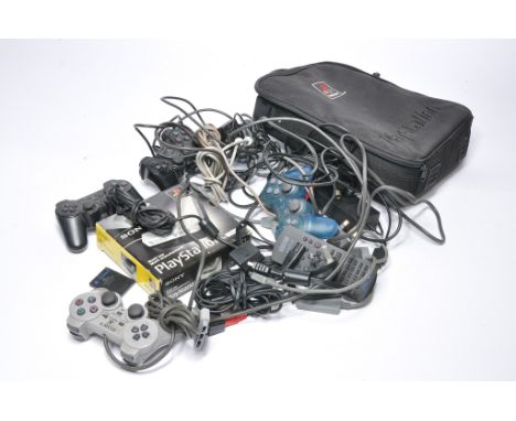 A group of Sony Playstation 1 and 2 controllers, wires and ancillary items. All untested. 