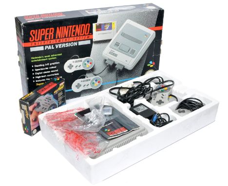 Nintendo SNES - Super Nintendo Video Game Console. Looks to be complete, as shown, in original box, plus additional boxed asc